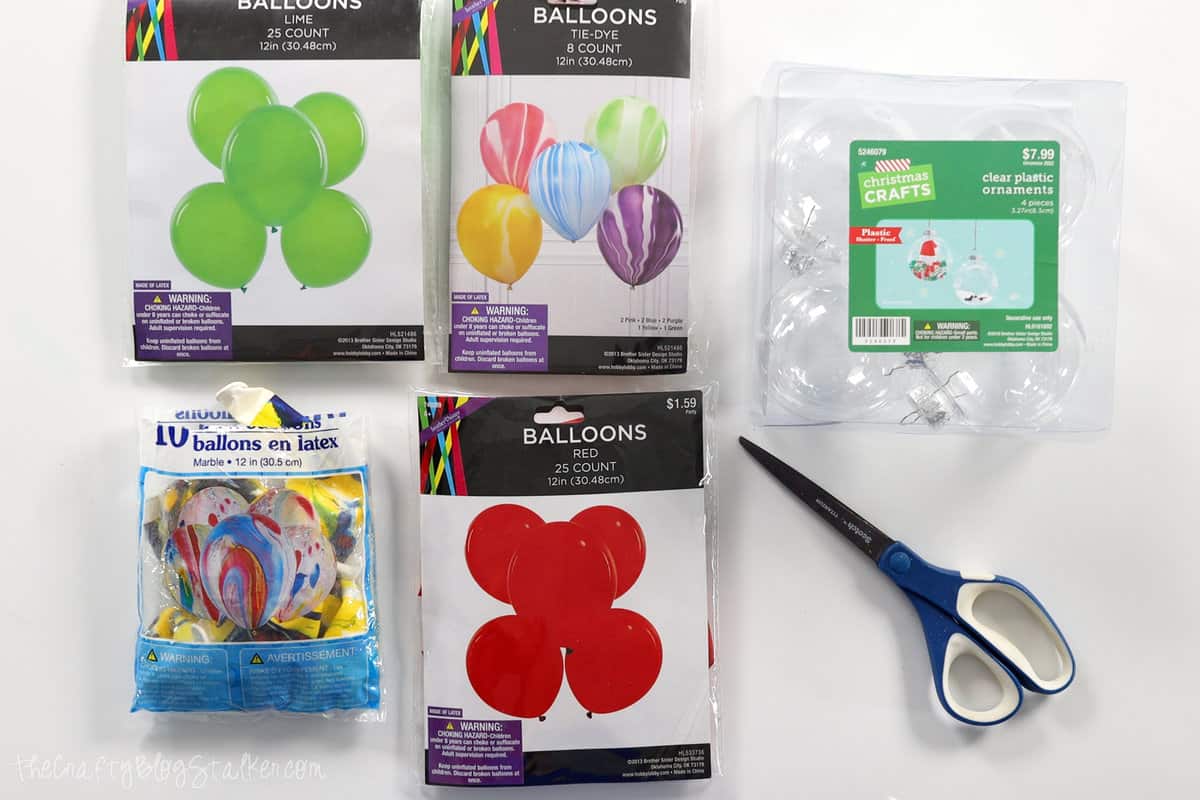 balloons, plastic ornaments and scissors