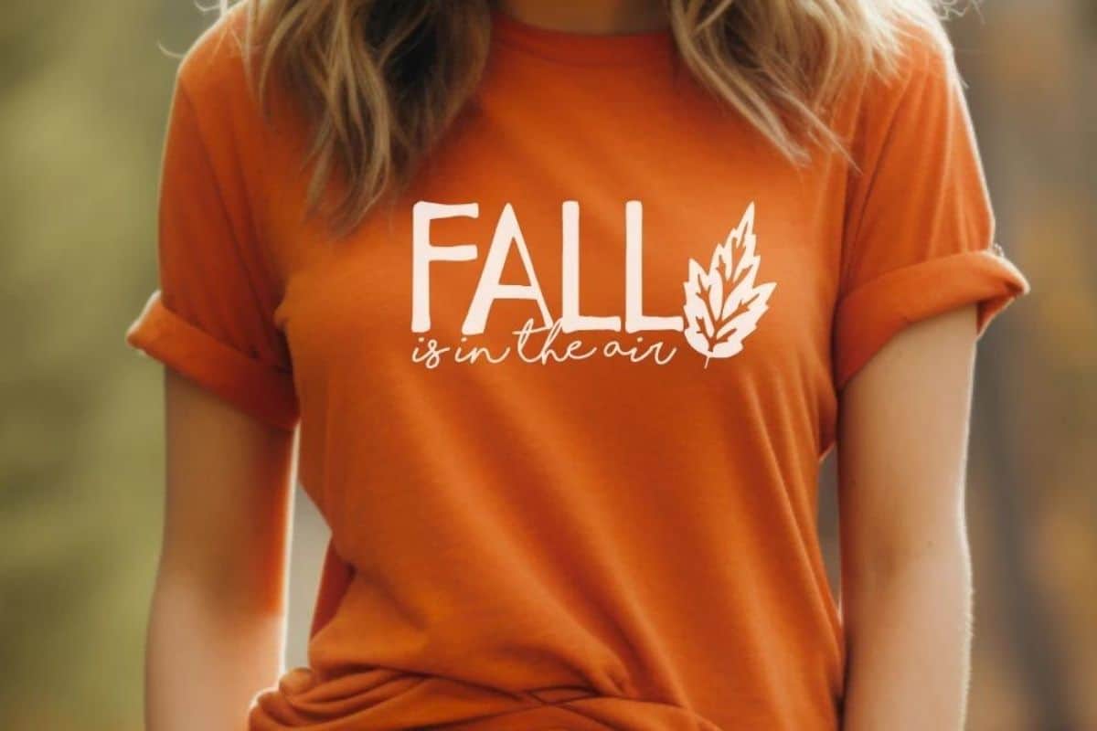 Free Fall is in the Air design on an orange t-shirt.