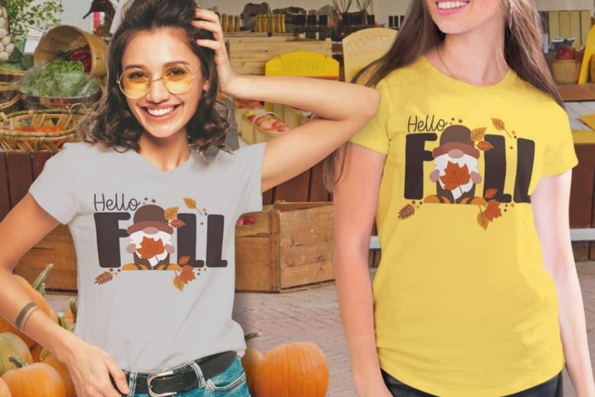 Two girls wearing a gnome shirt that reads 'Hello Fall'.
