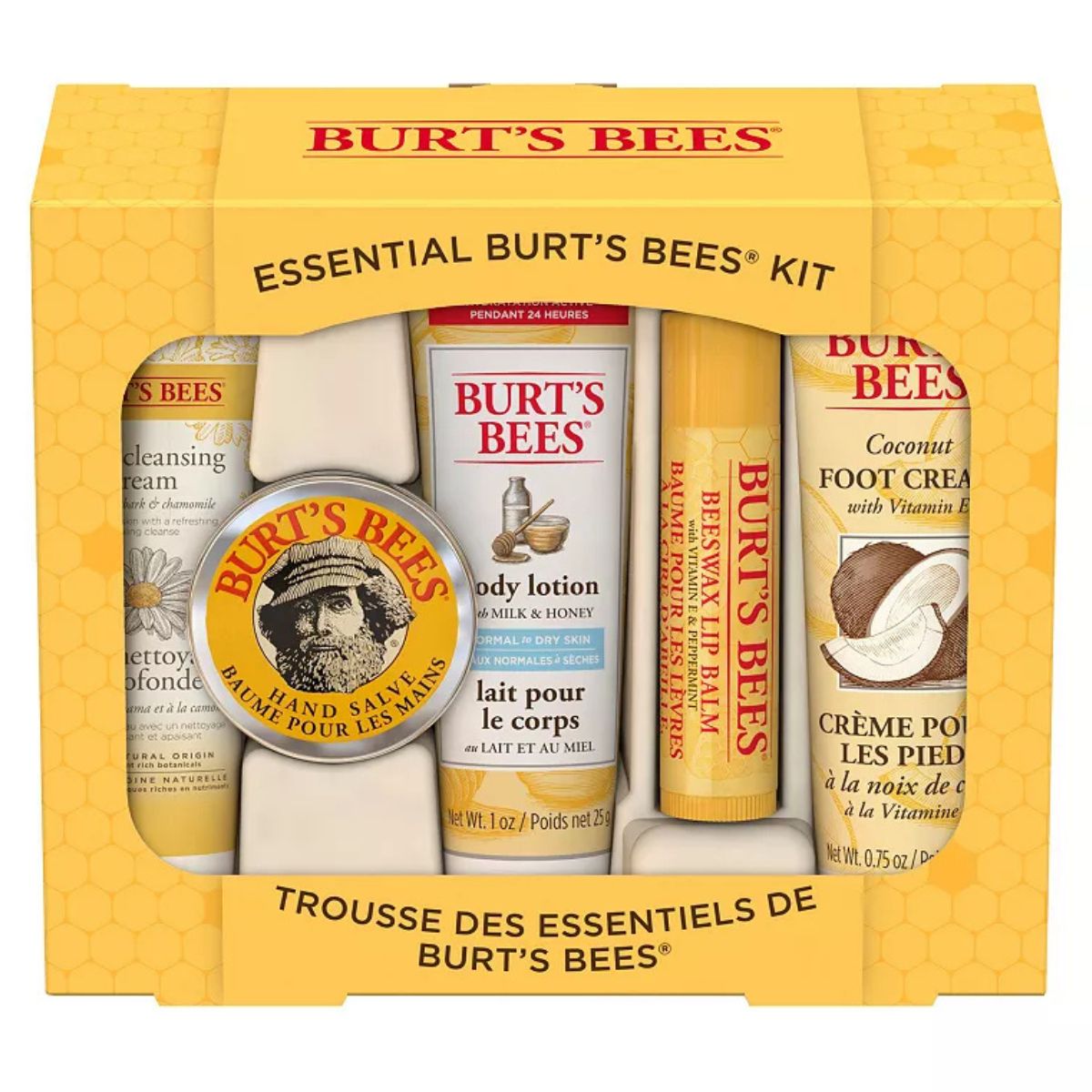 Burt's Bees Essential Gift Set with cleansing cream, hand salve, body lotion, lip balm, and coconut foot cream in yellow honeycomb packaging.