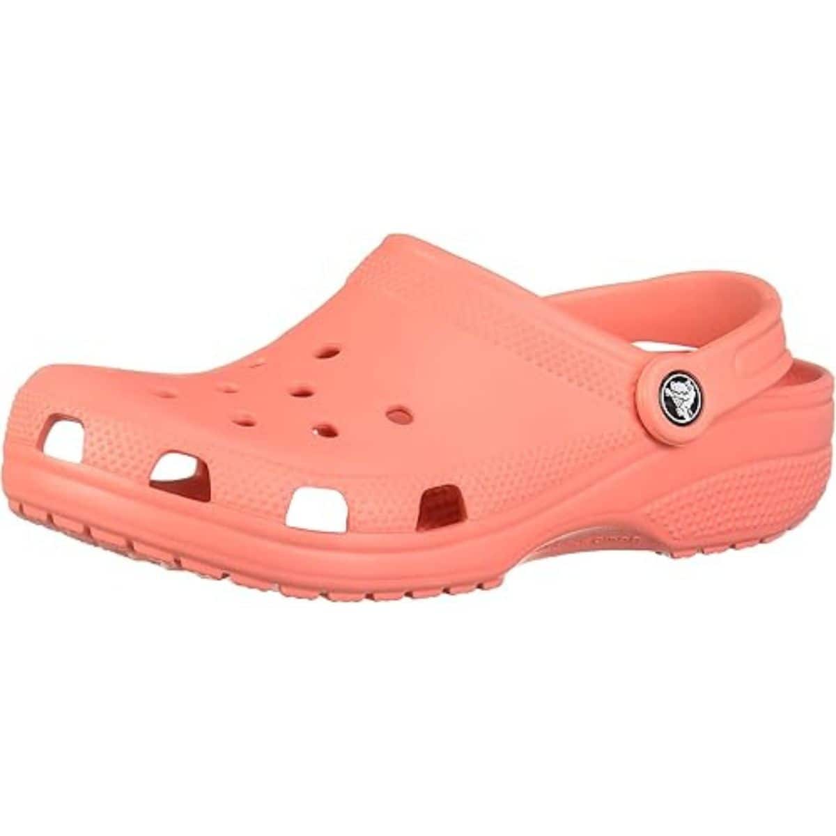 A single coral-colored kids' Crocs clog with ventilation holes and a back strap, shown from a side angle on a white background.
