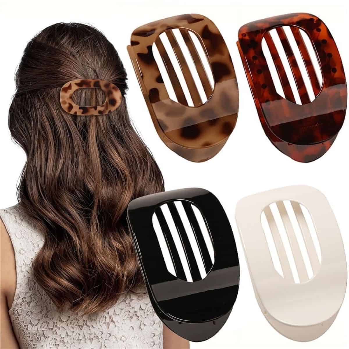 A set of large flat hair clips shown in tortoise, black, and cream, with one clip holding back wavy hair on a woman's head.