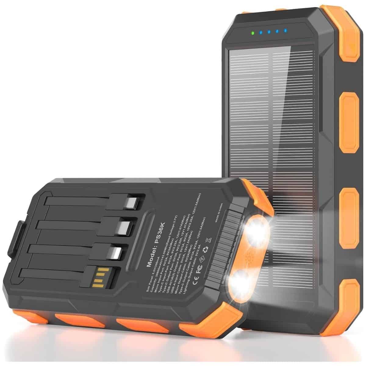 Black and orange solar charger power bank with a solar panel, multiple charging cables, battery indicator lights, and built-in flashlights.