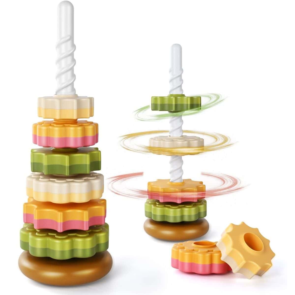 Colorful plastic stacking toy with gear-shaped rings that spin as they slide down a spiral rod, shown stacked on a round base with extra pieces nearby.