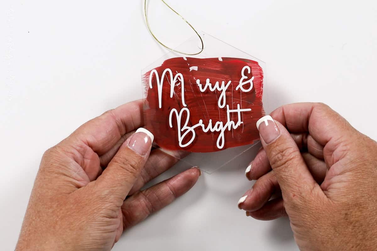 Merry & Bright acrylic ornament that is scratched