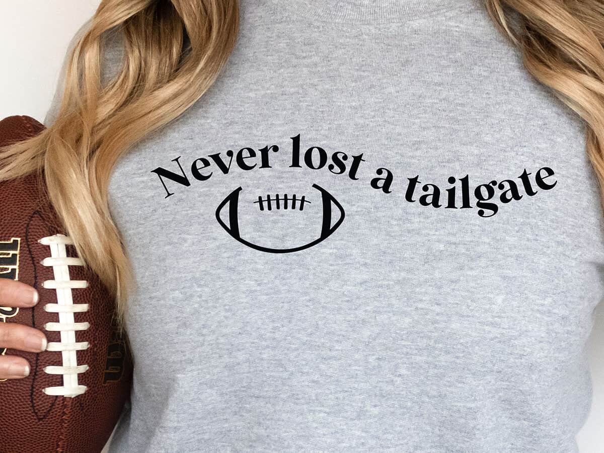 A T-shirt with a design that reads never lost a tailgate.