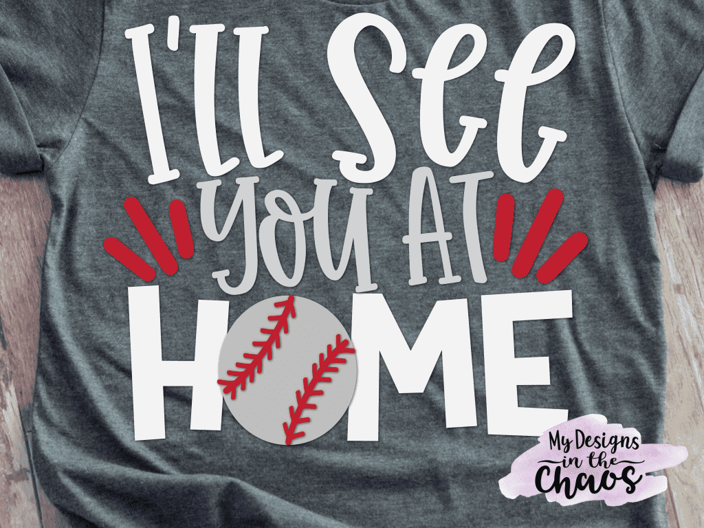 A T-shirt with a design that reads I'll see you at home, with a baseball.