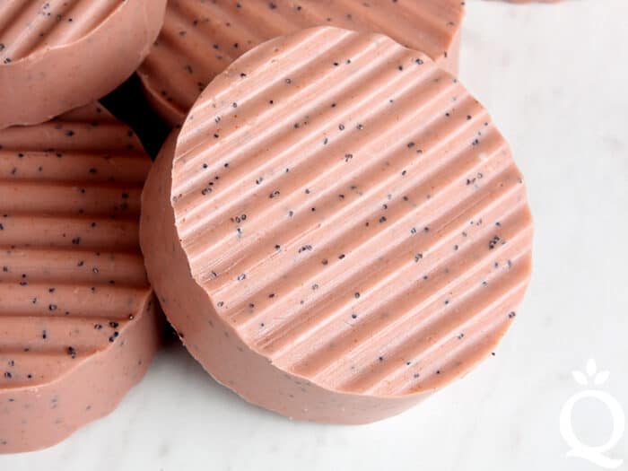 Rosehip Melt and Pour Soap that are wavy cut into circles.