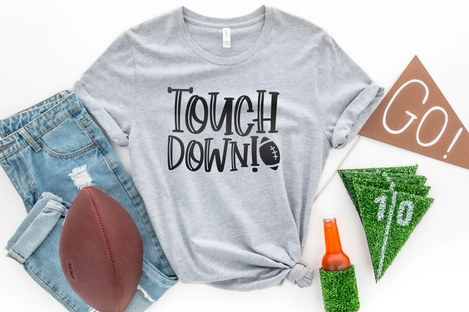 A T-shirt with a design that reads touch down!