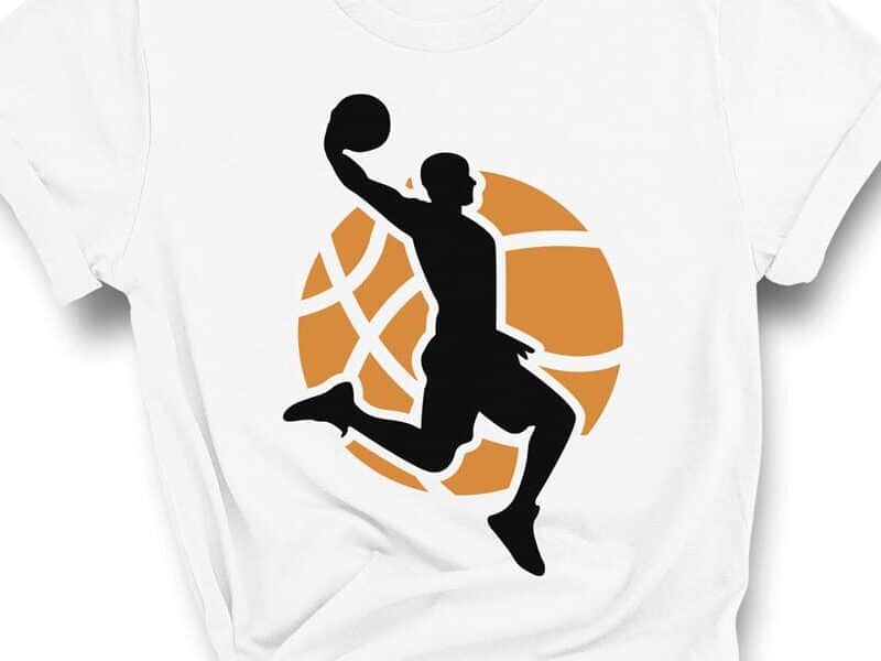 A T-shirt with a design that shows a basketball player and a basketball.