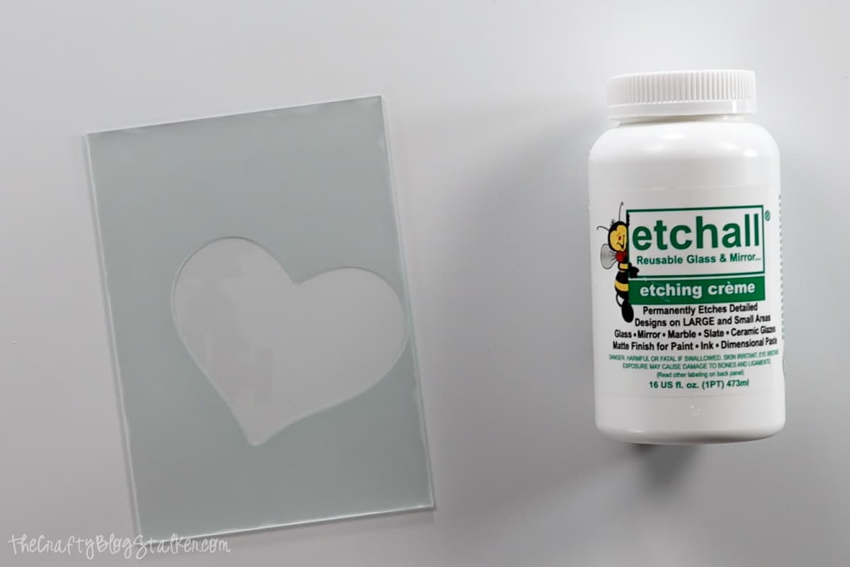Heart etched glass and a bottle of Etchall Etching Creme.