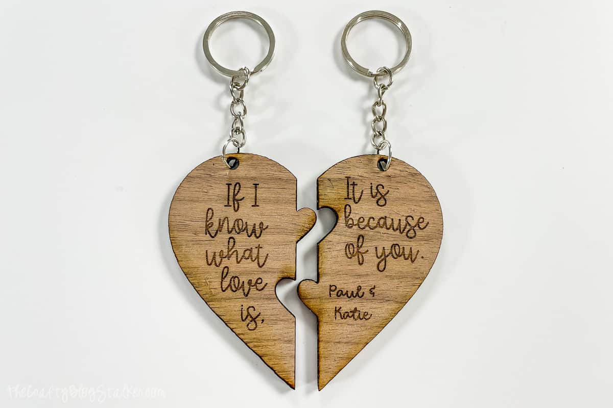 A pair of heart puzzle keychains.