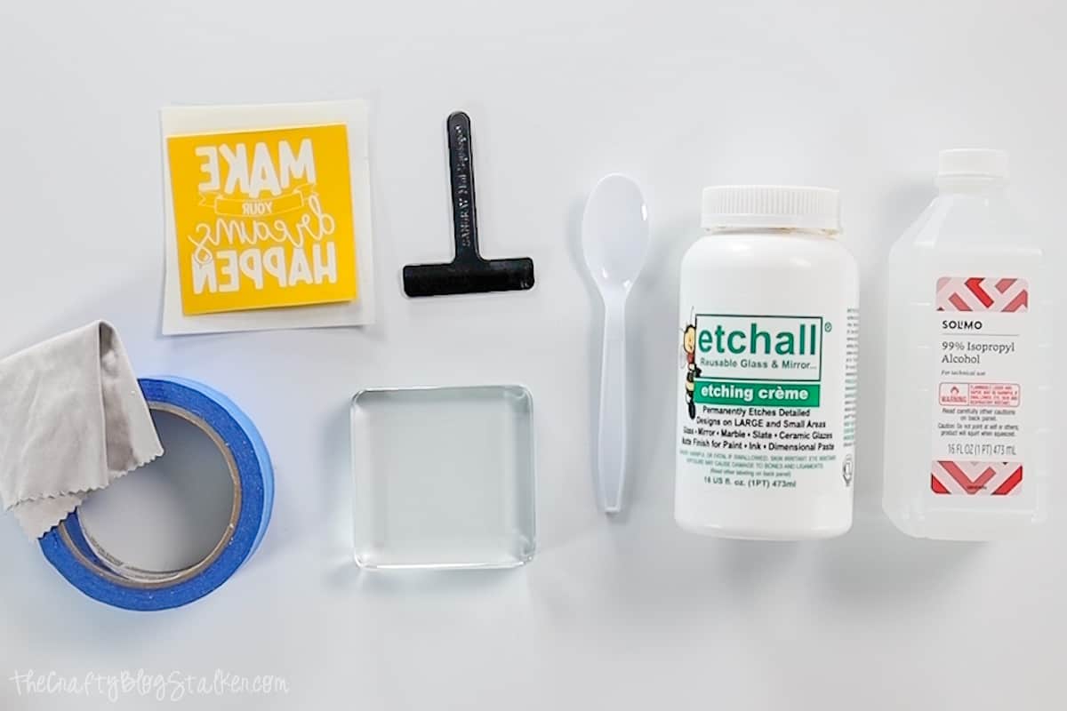 Supplies used to make the project: A bottle of Etchall Etching Creme, Isopropyl Alcohol, a glass block, squeegee tool, painter's tape and an Etchmask stencil.
