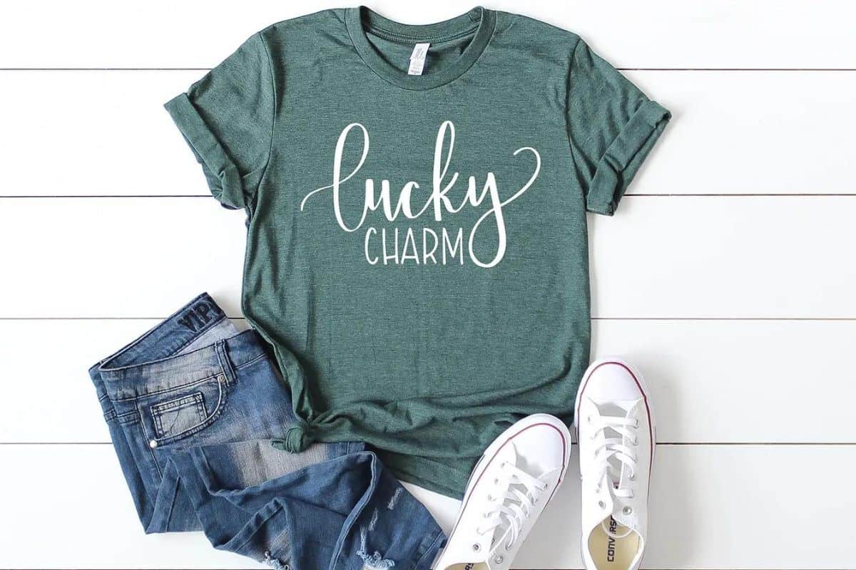 A green shirt with a design that reads lucky charm.
