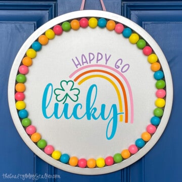 Happy go lucky door hanger.