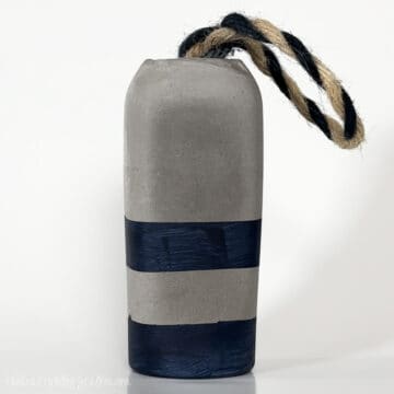 Cement buoy door stopper. Square image.