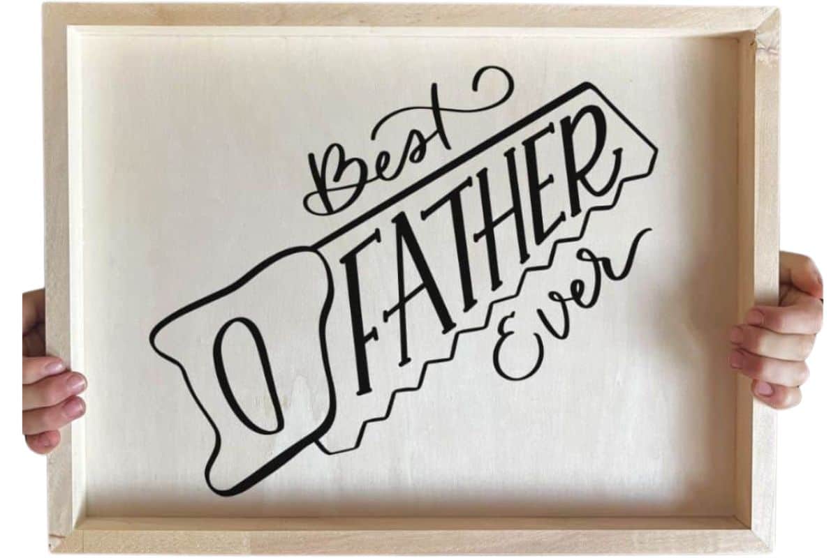 A wood tray with a design that reads "Best Father Ever".