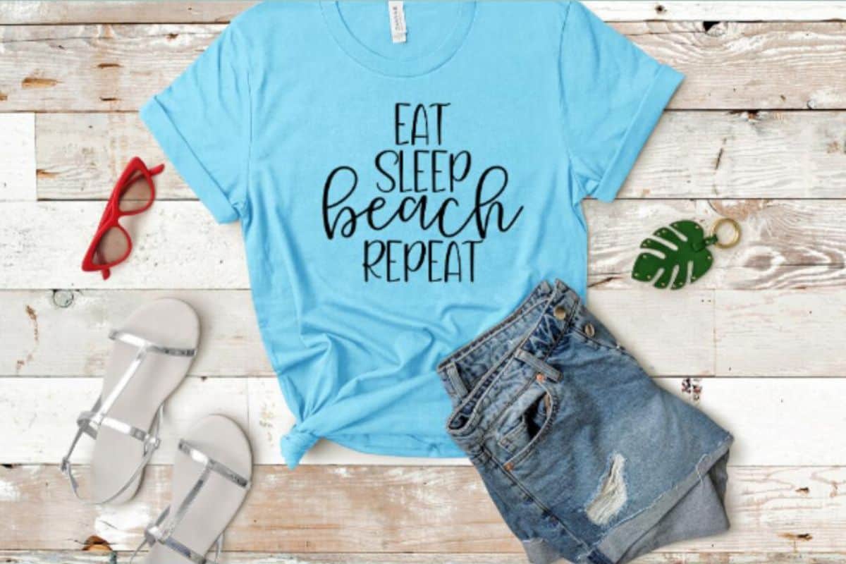 Eat Sleep Beach Repeat SVG Cut file on a t-shirt.