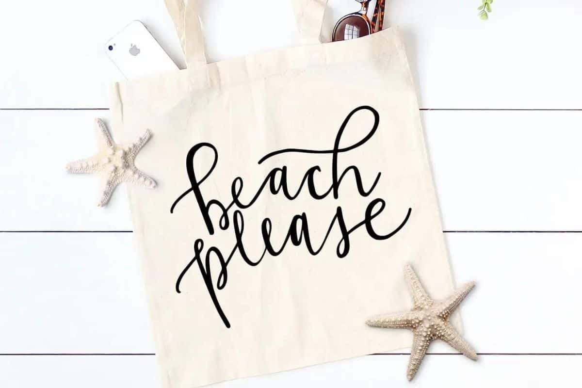 Summer beach SVG cut file on a tote bag.