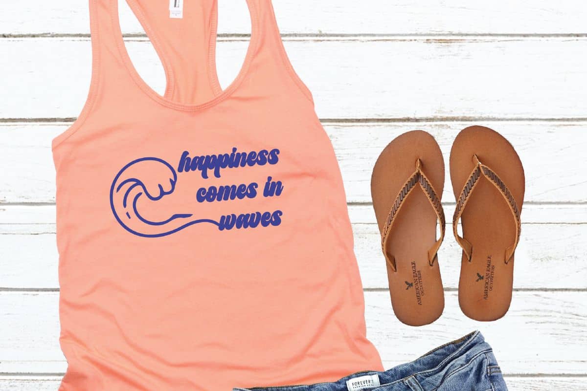 Happiness Comes in Waves SVG cut file on a tank top.