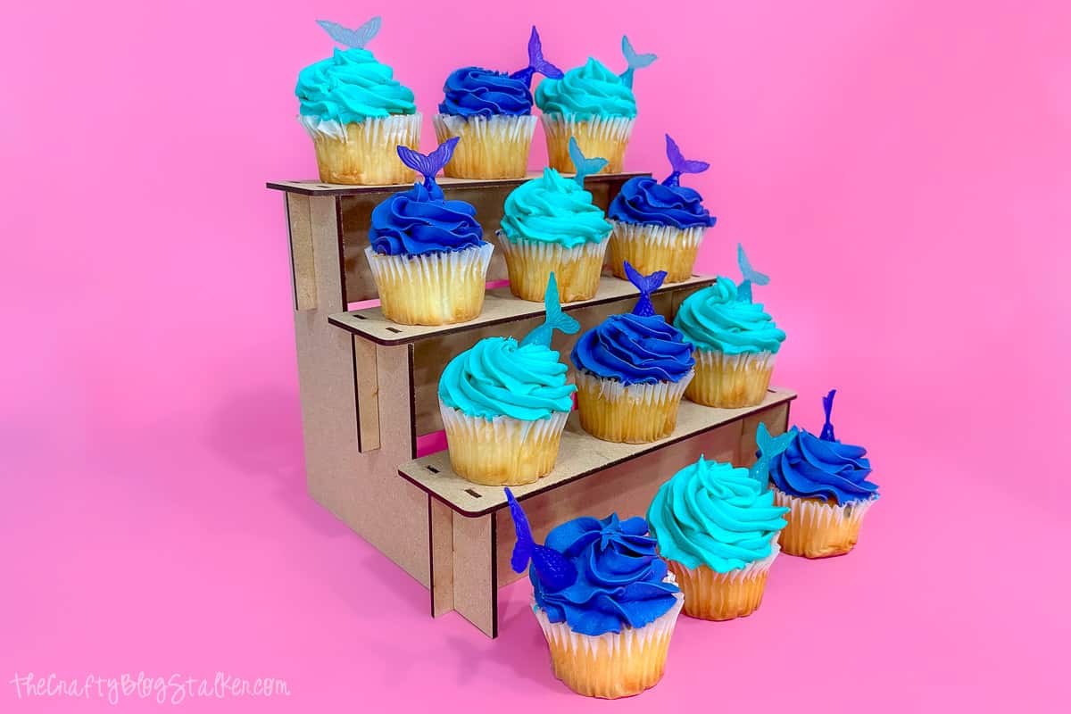 Wood cupcake stand with 12 cupcakes on 3 tiers.