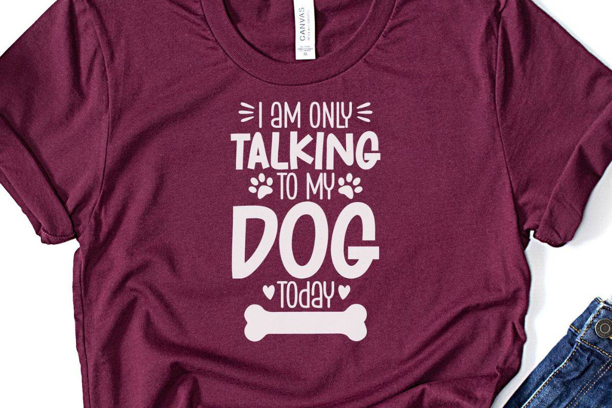 Red t-shirt with a design that reads I am only talking to my dog today.