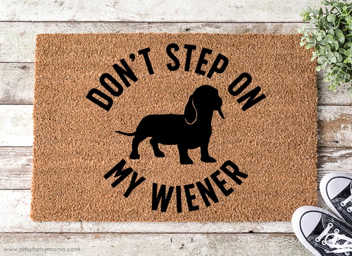 Front door mat that reads 'don't stop on my wiener'.