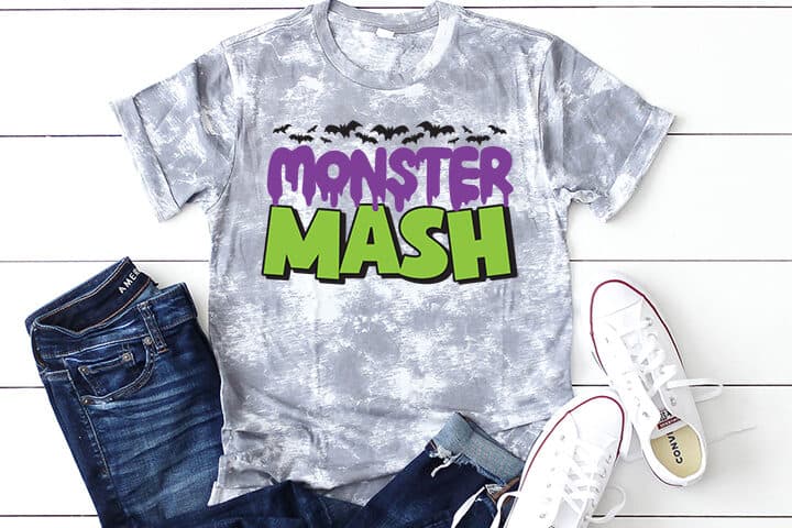 Grey and white t-shirt with a Monster Mash design.