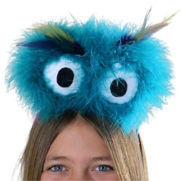 A girl wearing fluffy monster eyes headband.