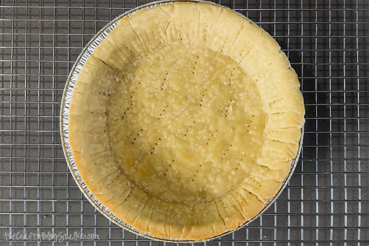 Baked pie crust cooling.