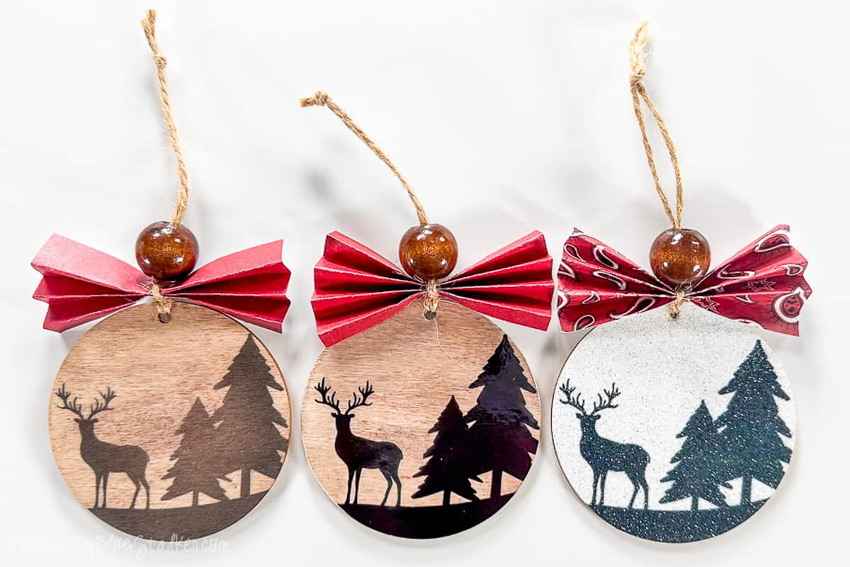 The result of 3 different ways to sublimate on wood ornaments.