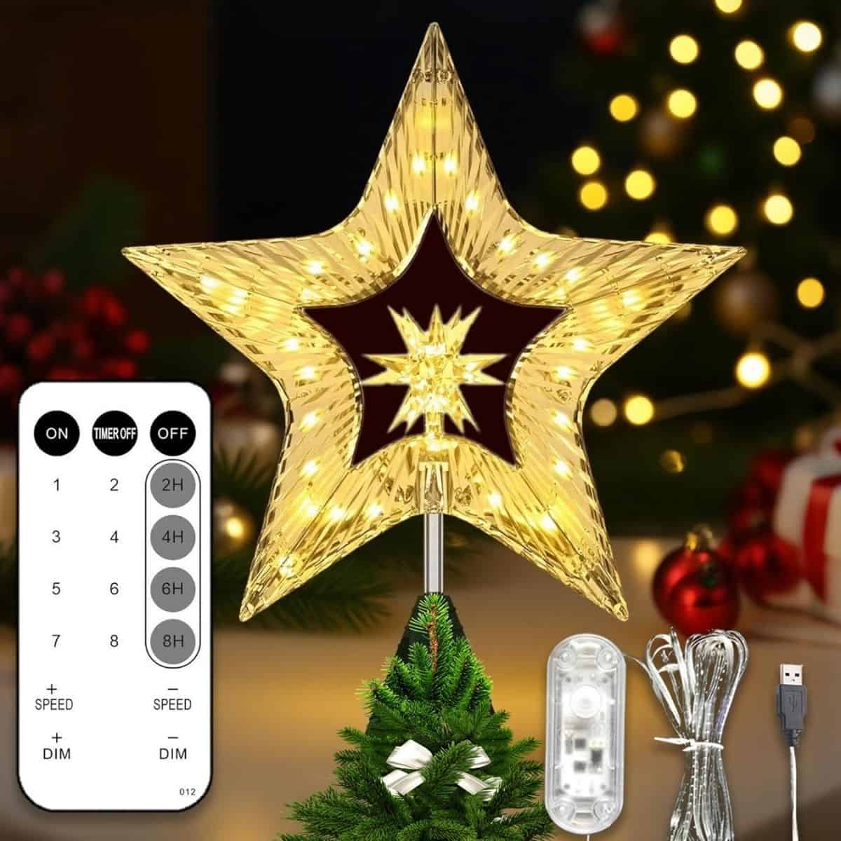 Lighted gold star Christmas tree topper with USB cord, remote control, and timer settings, shown glowing on a decorated Christmas tree.