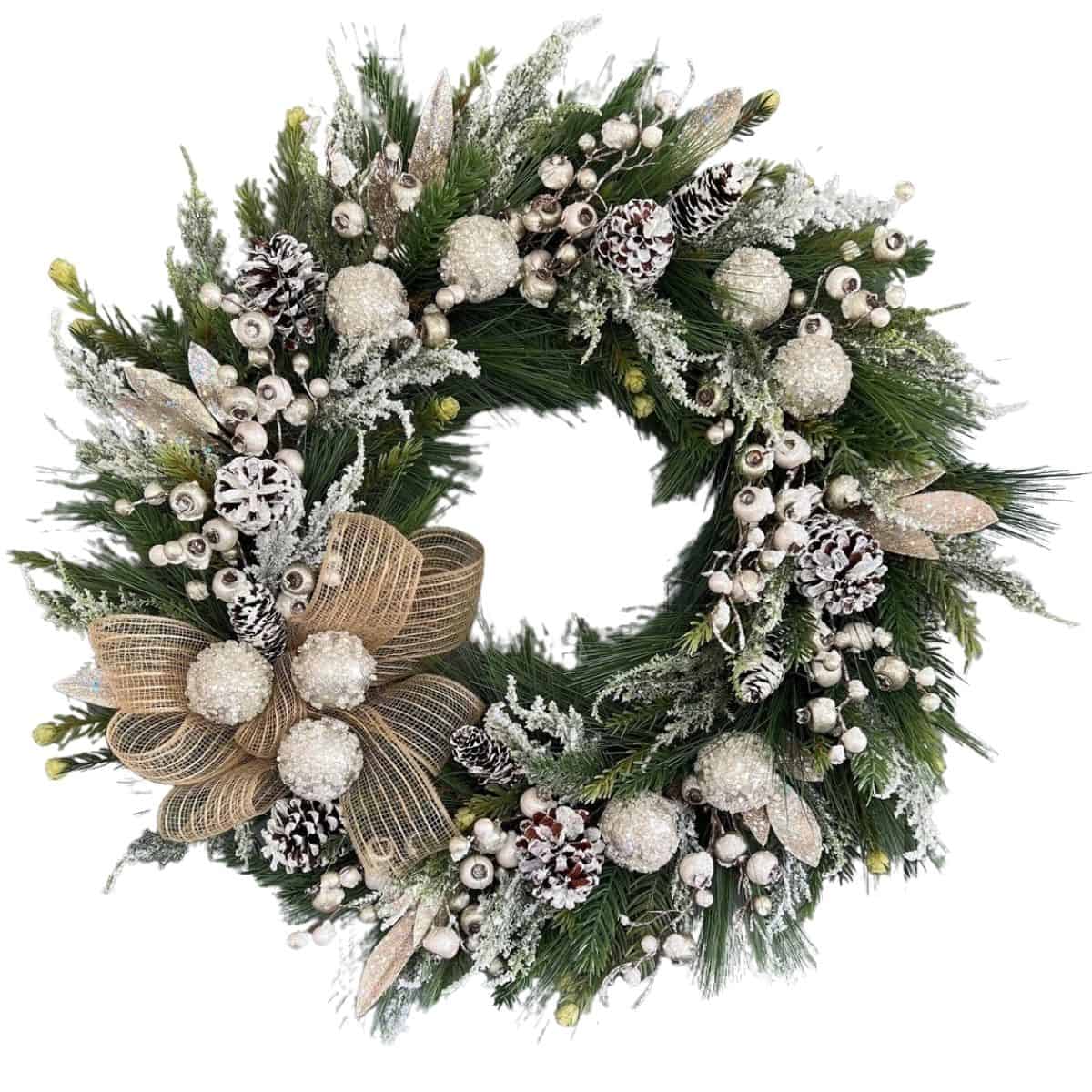 Gold and white Christmas wreath decorated with frosted pinecones, glittery ornaments, silver berries, and a gold ribbon bow on evergreen branches.