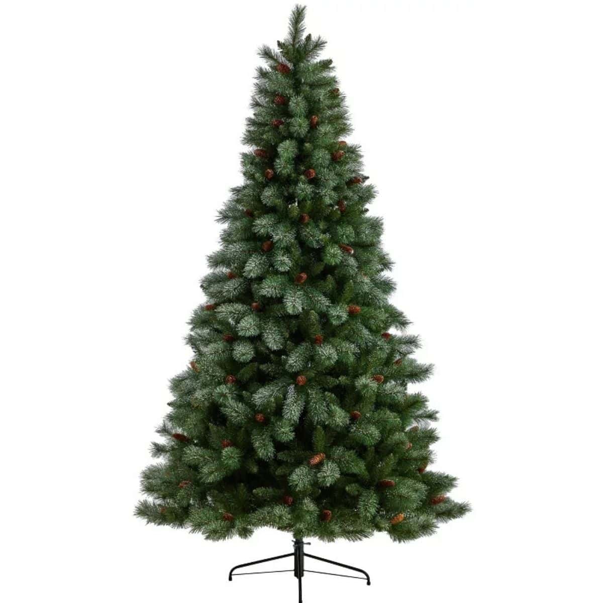 Tall artificial pine Christmas tree with full green branches, light snow detailing, and small pinecones, displayed on a black metal stand against a white backgro