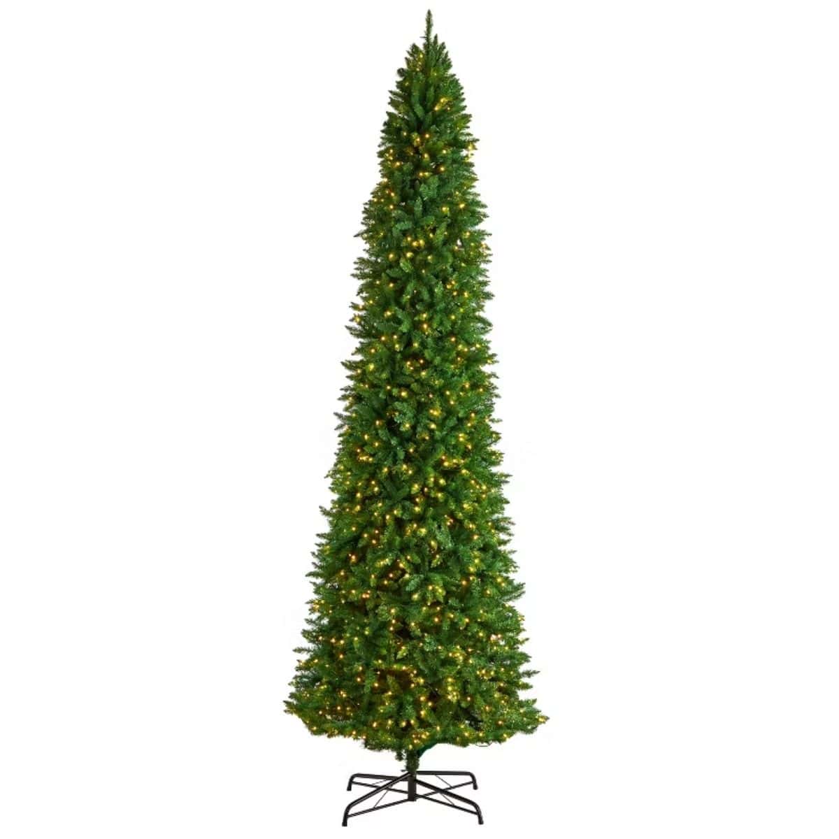 Artificial Christmas tree with full green branches and warm white lights, displayed on a stand against a plain white background.