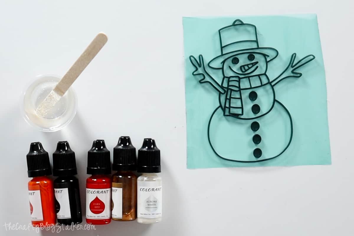 Resin colorant and Snowman cut out.