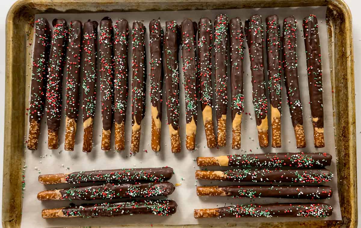 Peanut butter and chocolate dipped pretzel rods.
