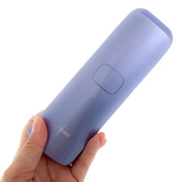 Hand holding the Ulike IPL Hair Removal Device.