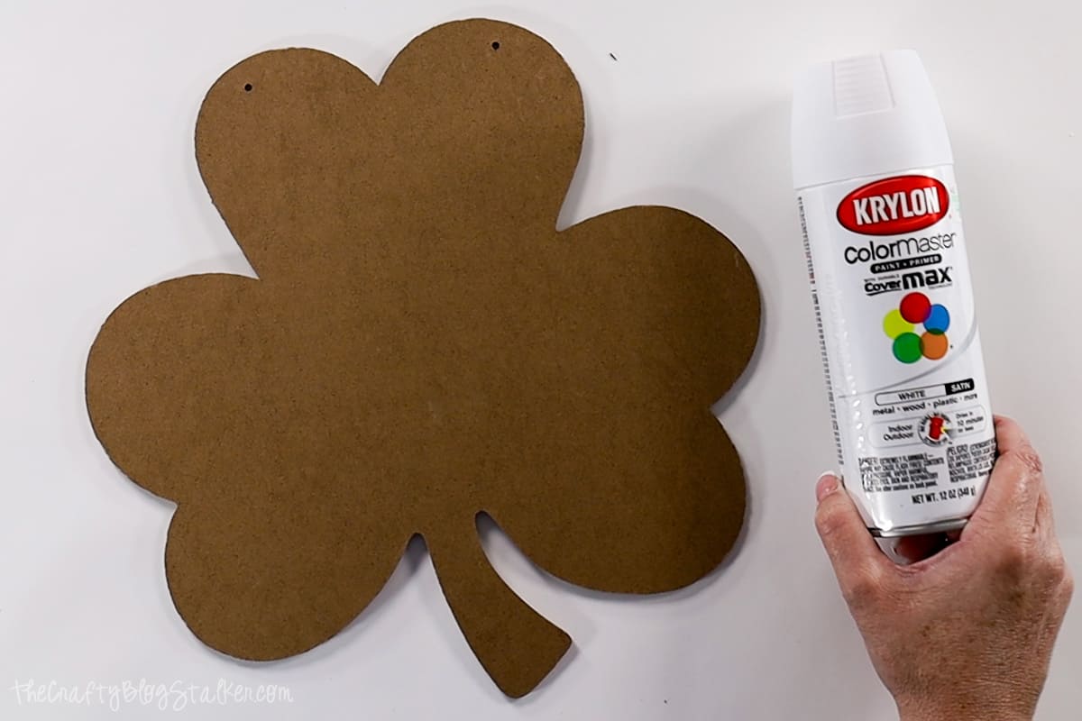 Shamrock shape and a can of white spray paint.