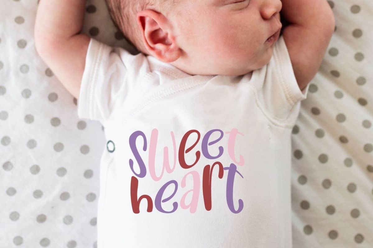 Baby wearing a shirt with a sweetheart design.