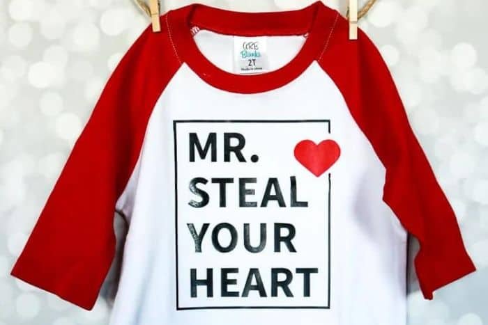 T-shirt with a design that reads 'Mr. Steal Your Heart'.