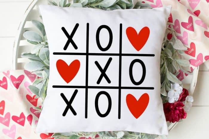 Home Decor pillow with a Heart Tic Tac Toe design.