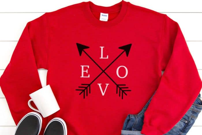 A red sweatshirt with the word LOVE and arrows.