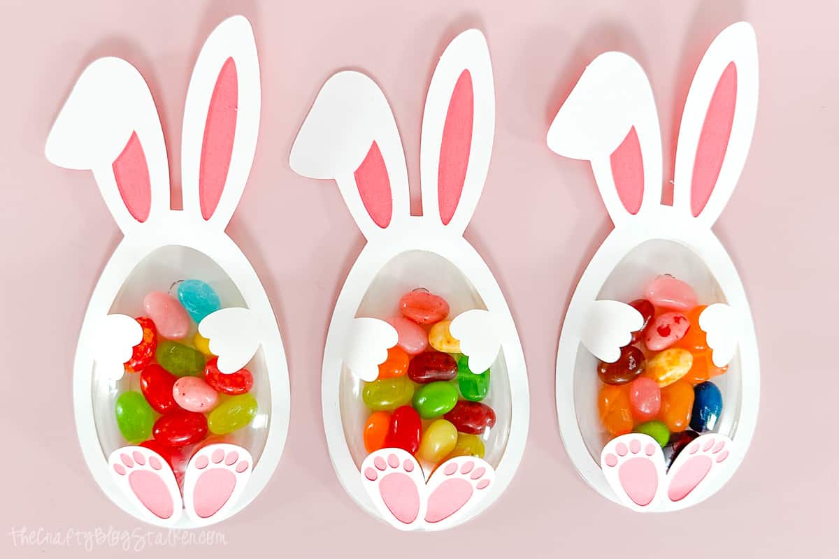 3 Easter Bunny Candy Shakers filled with jelly beans.