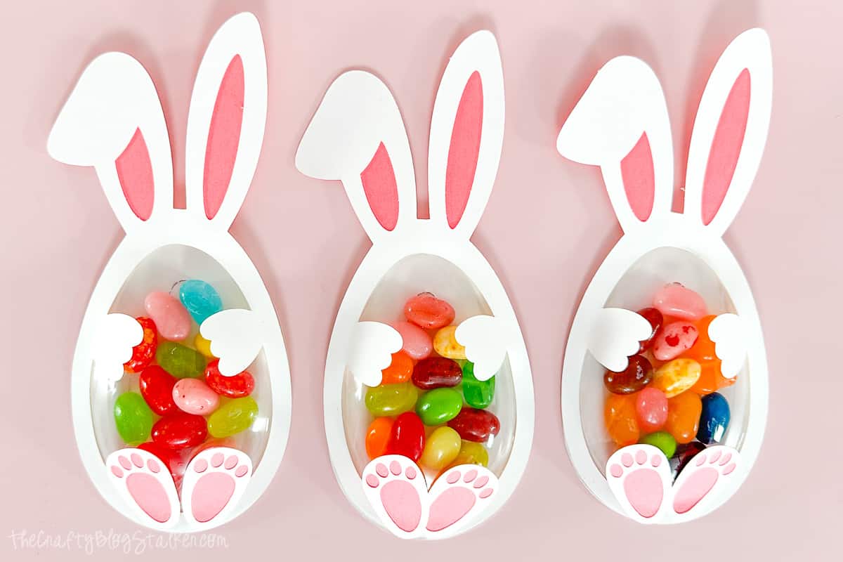 3 Easter Bunny Candy Shakers filled with jelly beans.
