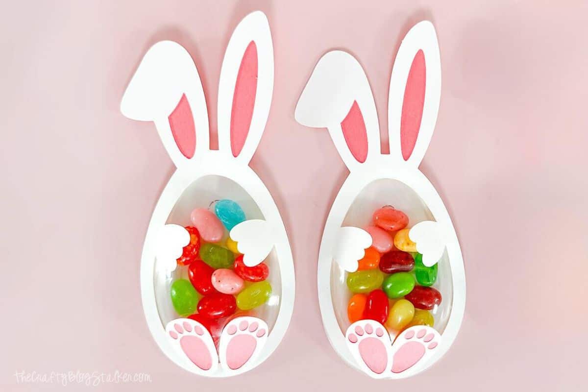 2 Easter Bunny Candy Shakers filled with jelly beans.