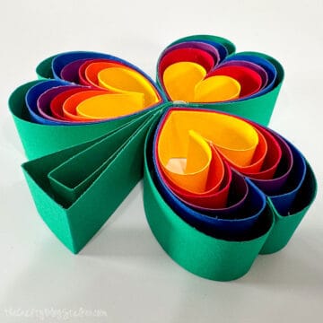 St Patricks Day rainbow shamrock made with strips of paper.