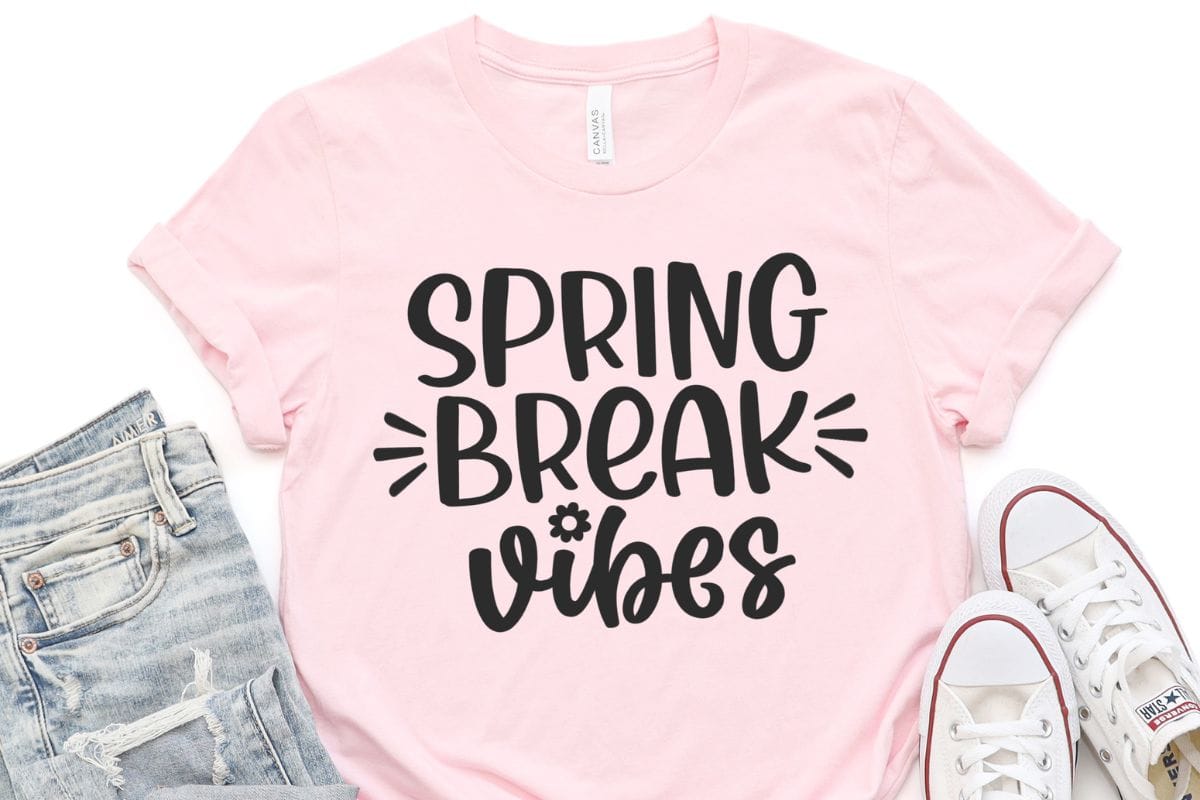 pink t-shirt with a Spring Break Vibes svg design.