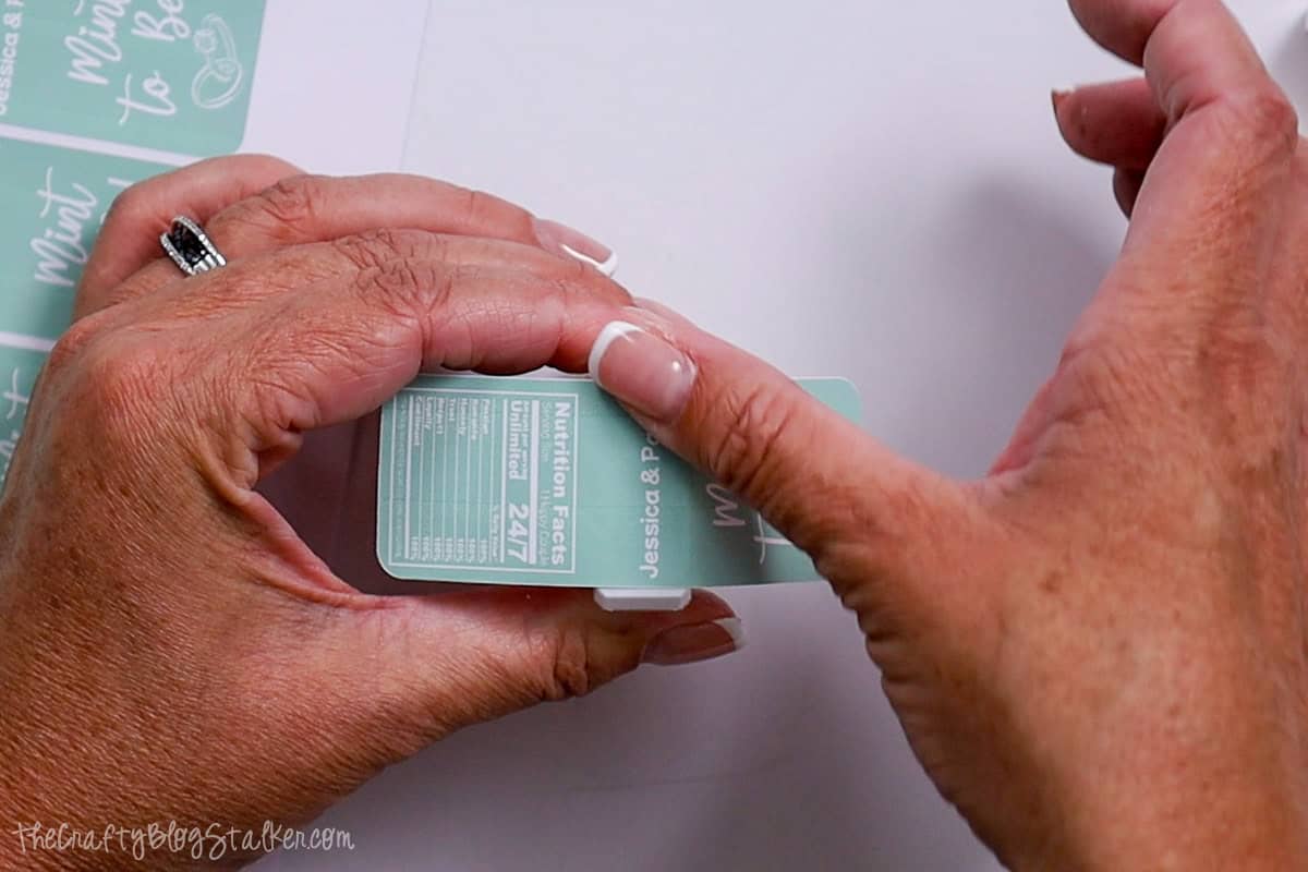 Centering the label on top of the tic tac container.