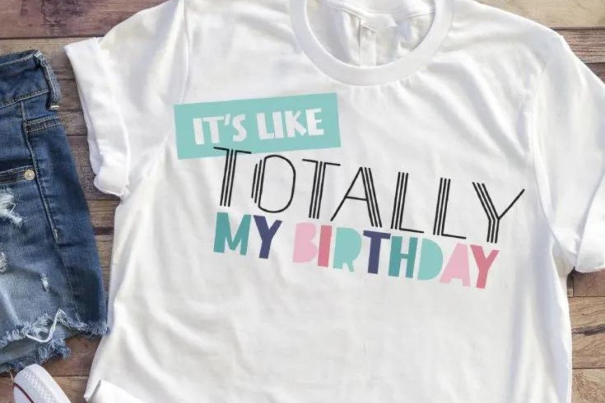 White t-shirt with the design "It's like totally my birthday'.